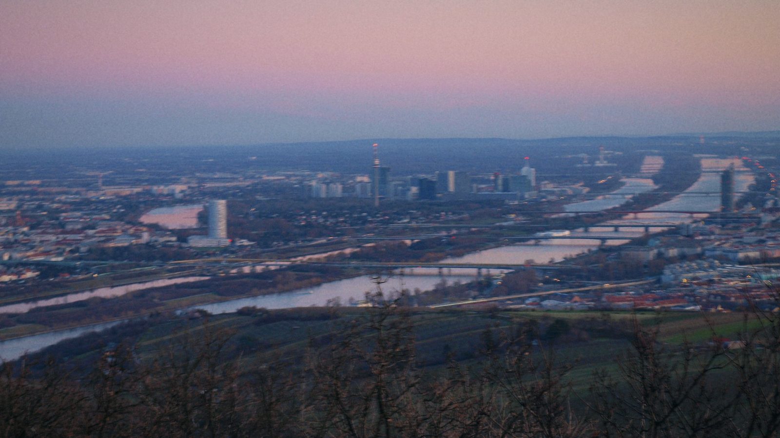 View from Kahlenberg over Vienna and the Danube at dusk